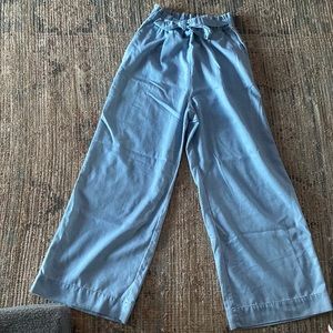 Blue wide leg pants with elastic waist and tie belt